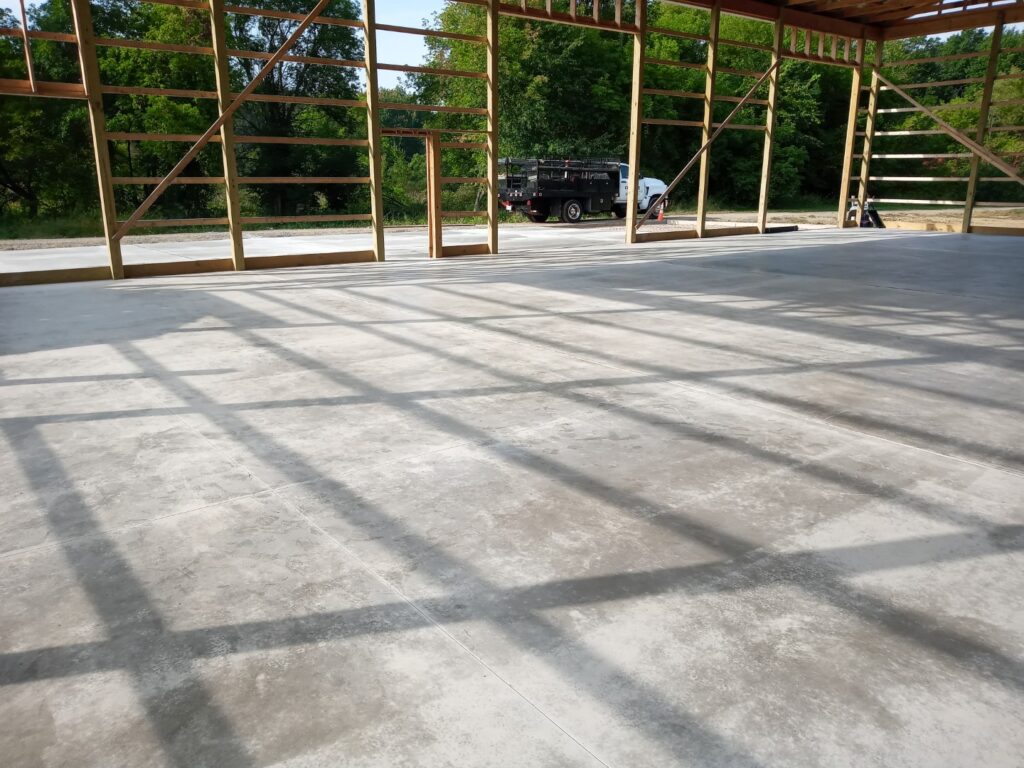 Install concrete slab for pole barn floor